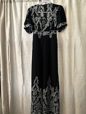 Black Light Jumpsuit with White Floral Accent